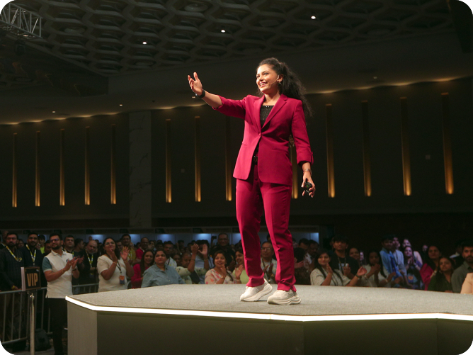 Nidhi Pathak, founder of Fit Bharat Mission, on stage at a live event
